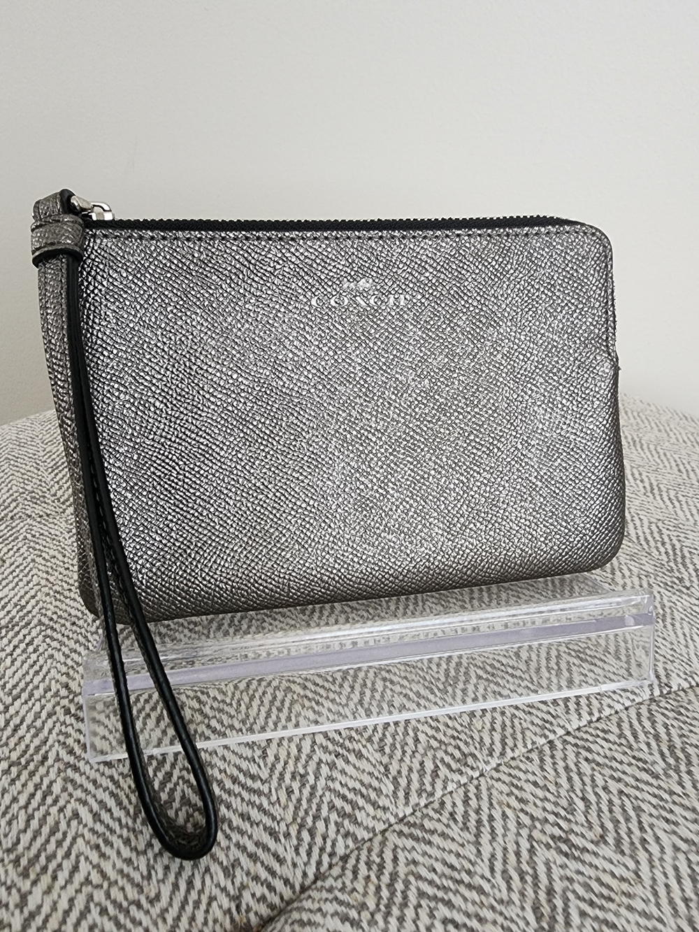 EUC Coach Corner Zip Wristlet in a metallic silver/gunmetal crossgrain leather